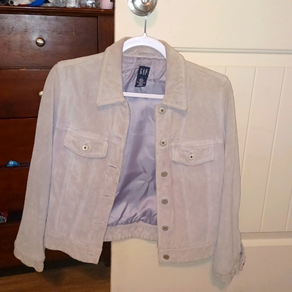 Grey jacket from GAP size small 100% polyester inside cow split leather shell